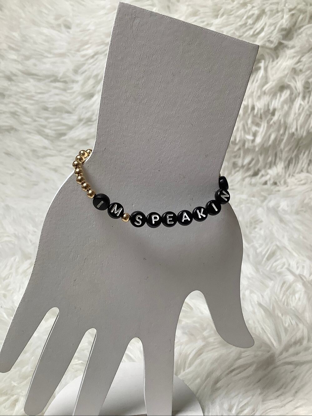 Larissa Loden Gold Tone Black I'm Speaking Beaded Charm Stretch Bracelet F17-1